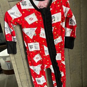 NWT. santa wishes bamboo ruffle butt zippy 3/6 months.